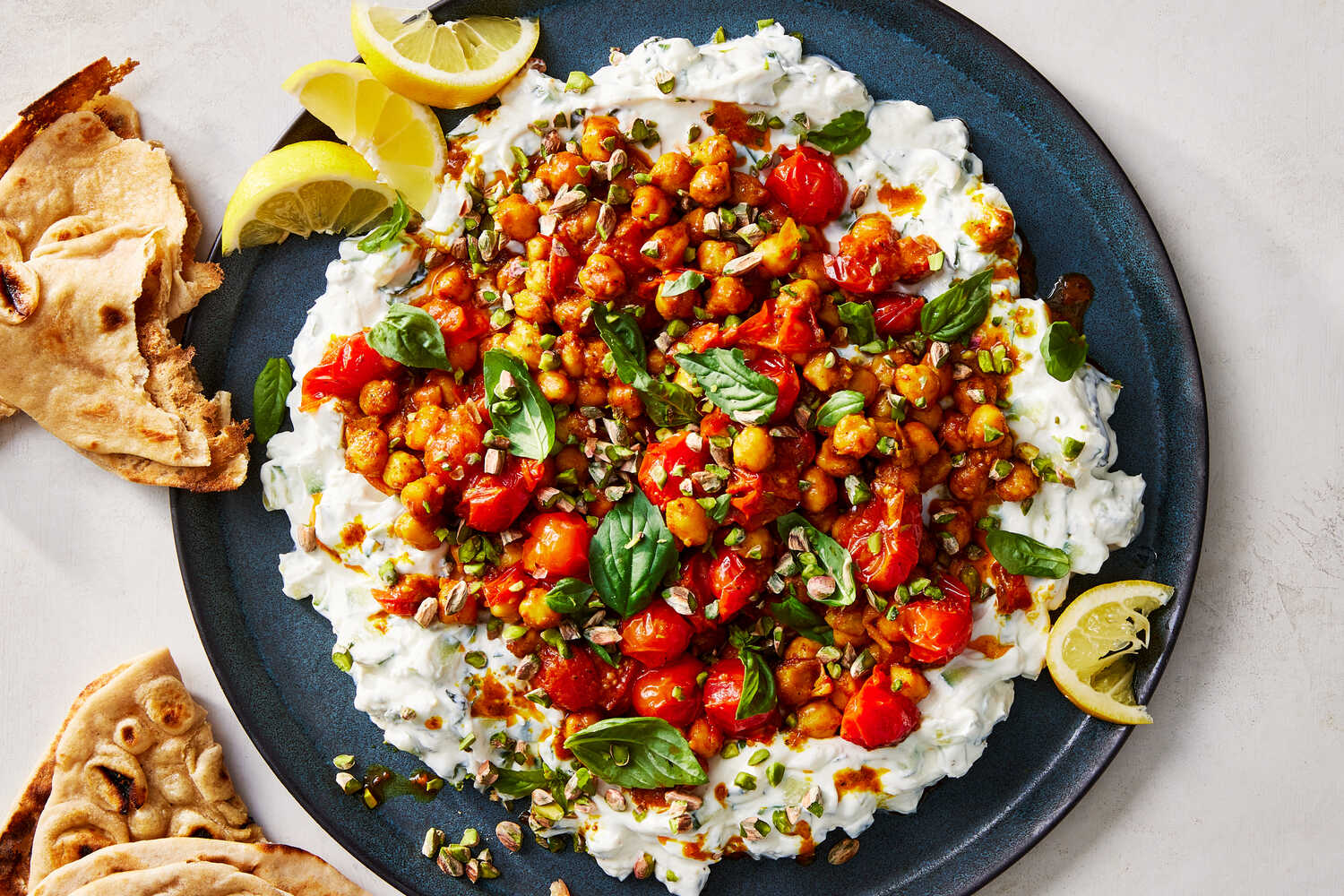 Curry Tomatoes and Chickpeas With Cucumber Yogurt Recipe